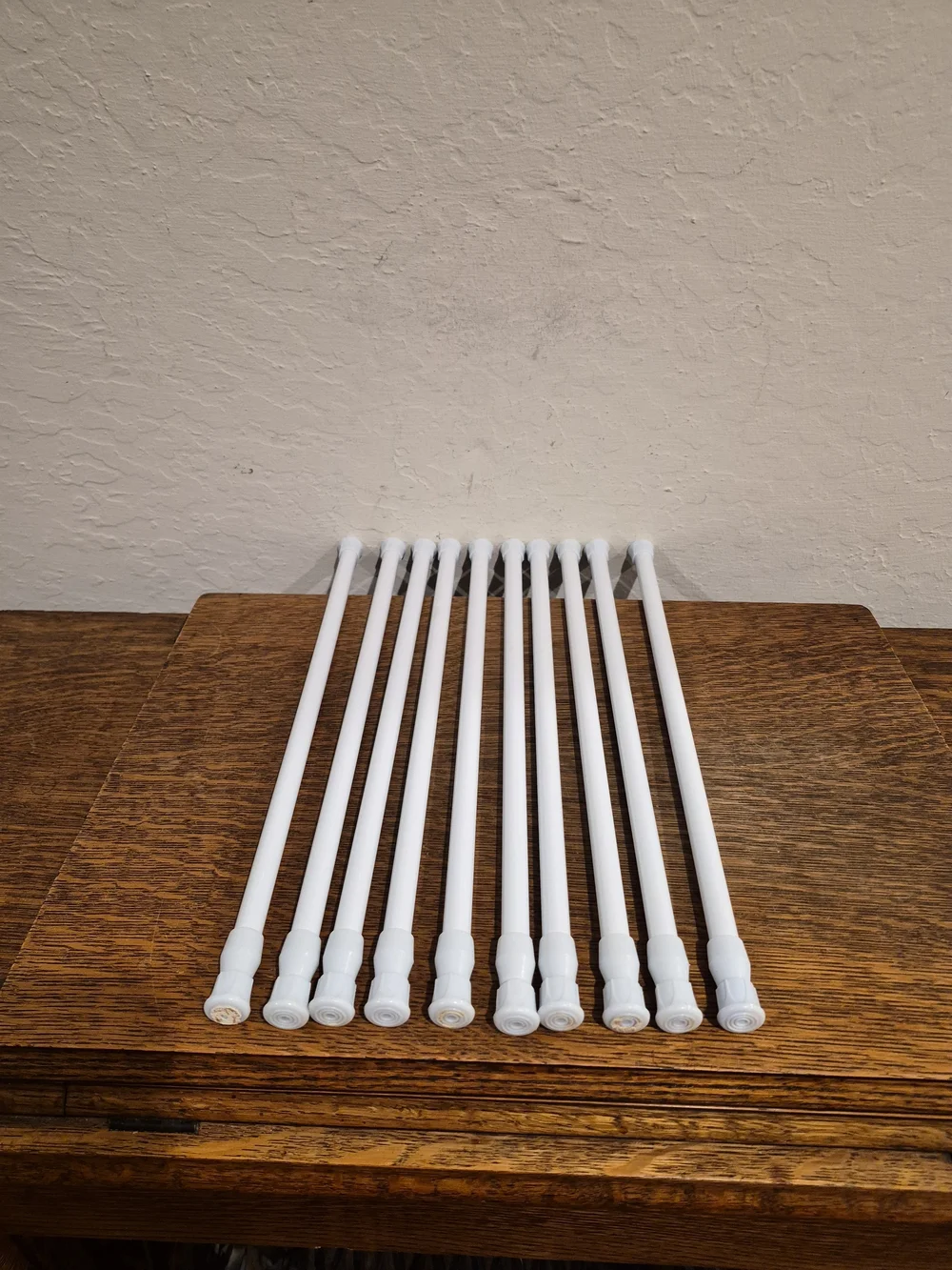 Set of 10 White Adjustable Spring Tension Curtain rods. 16